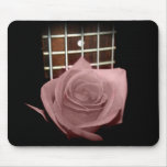 Pink brown tint rose against five string bass fret mousepad