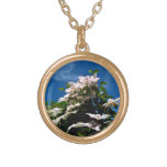 Pink clematis blossoming on a sunny day pendants