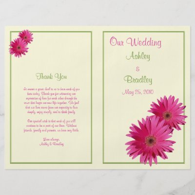 The text on this pink gerbera daisy green border wedding program is fully