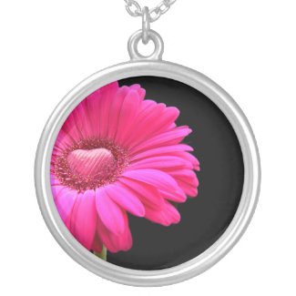 http://rlv.zcache.com/pink_gerbera_with_heart_necklace-p177894899569728931xfw45_325.jpg