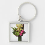Pink roses, green anthuriums, cymbidium orchids key chains