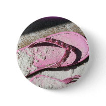 Pink sandy flip flop sandals on Florida beach
