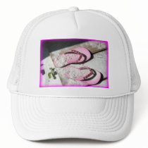 Pink sandy flip flop sandals on Florida beach Hat