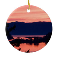 Pink Sunset Over the Ocean Christmas Ornaments