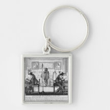 Plate engravers working with gallery key chains