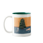 Playful Christmas cats by the tree, mugs and cups