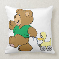playful teddy bear with toy ducky