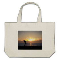 Playing Golf At Sunset bags