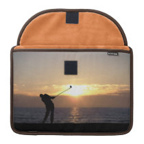 Playing Golf At Sunset macbook sleeves