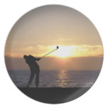 Playing Golf At Sunset Dinner Plate