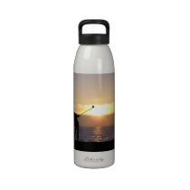 Playing Golf At Sunset water bottles