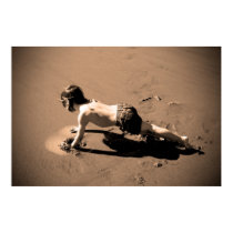 Playing on the beach posters