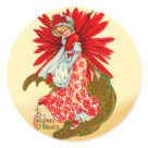 round_sticker - Pretty vintage lady with Poinsettia flower pattern on her dress and hat. This Christmas design has a large red Poinsettia background that frames the woman as she walks on a golden path.: Sizes 