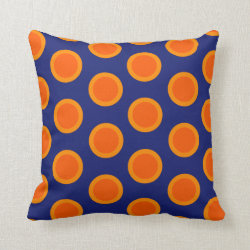 Polka dot oranges on blue pillow