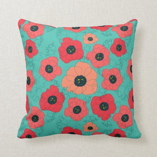 poppy spin coral on teal throw pillows Zazzle