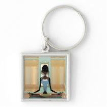 Portrait of young woman doing yoga key chain