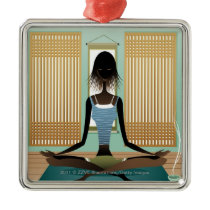 Portrait of young woman doing yoga christmas tree ornament