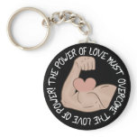 Power of love must overcome love of power key chain