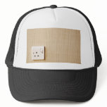 Power outlet at the corner of a wall hats