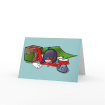 Present-Wrapping Penguin Greeting Card