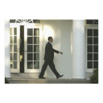 President Barack in deep thought as he walks
