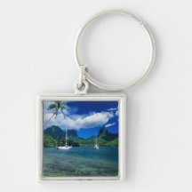 Private yachts anchored in Opunohu Bay on the Keychains
