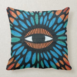 Protective eye graffiti in orange and blue pillows