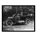 Proud Woman Behind the Wheel of her Car 1914 posters