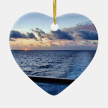 Puesta del sol en el ornamento del mar adorno