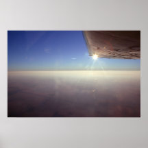 Puestas del sol debajo del ala poster