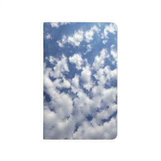 Puffy Clouds On Blue Sky