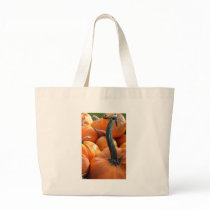 Pumpkin close-up tote bags