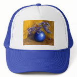 Purple flowers in Blue Vase and Gold Background Trucker Hats