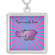 Purple hippo on pink sunburst pendants