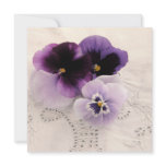 purple pansies on decorative fabric invitation