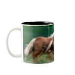 Racing Palomino Horses Coffee Mug
