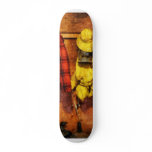 Rain Gear and Red Plaid Jacket Skateboard