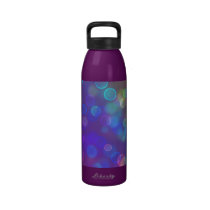 rainbow bokeh in a blue haze water bottles