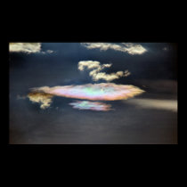 Rainbow hued cloud at dusk posters
