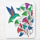  - The simple graphic shapes and the  brilliant colors of the hummingbird  and trumpet shaped flowers blend  together in shades of green, pink,  orange and fuschia. This vibrant colorful artwork is featured on  hummingbird clothing and gifts. Delight your hummingbird  lover today with this beautiful gift.: Sizes 