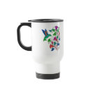  - The simple graphic shapes and the  brilliant colors of the hummingbird  and trumpet shaped flowers blend  together in shades of green, pink,  orange and fuschia. This vibrant colorful artwork is featured on  hummingbird clothing and gifts. Delight your hummingbird  lover today with this beautiful gift.: Sizes  Available colors: white