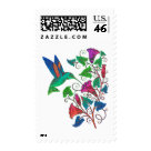  - The simple graphic shapes and the  brilliant colors of the hummingbird  and trumpet shaped flowers blend  together in shades of green, pink,  orange and fuschia. This vibrant colorful artwork is featured on  hummingbird clothing and gifts. Delight your hummingbird  lover today with this beautiful gift.: Sizes 