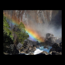 Rainbow over river posters