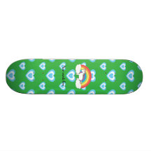 Rainbow unicorn with blue hearts on green skateboard decks