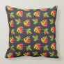 red and yellow , earthy tone leaves on black pillow