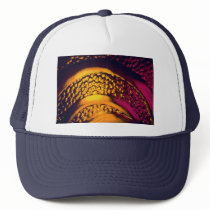 Red-gold arcing blobs trucker hat