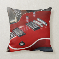 Red guitar on amp throw pillows