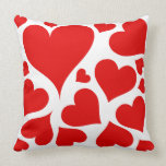 Red hearts on white love pillow