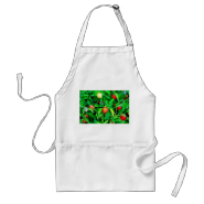 red hot peppers in green leaves apron