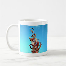 Red leaves against blue sky mug